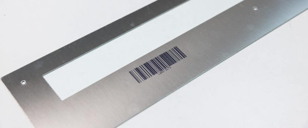 Metal plate with a barcode