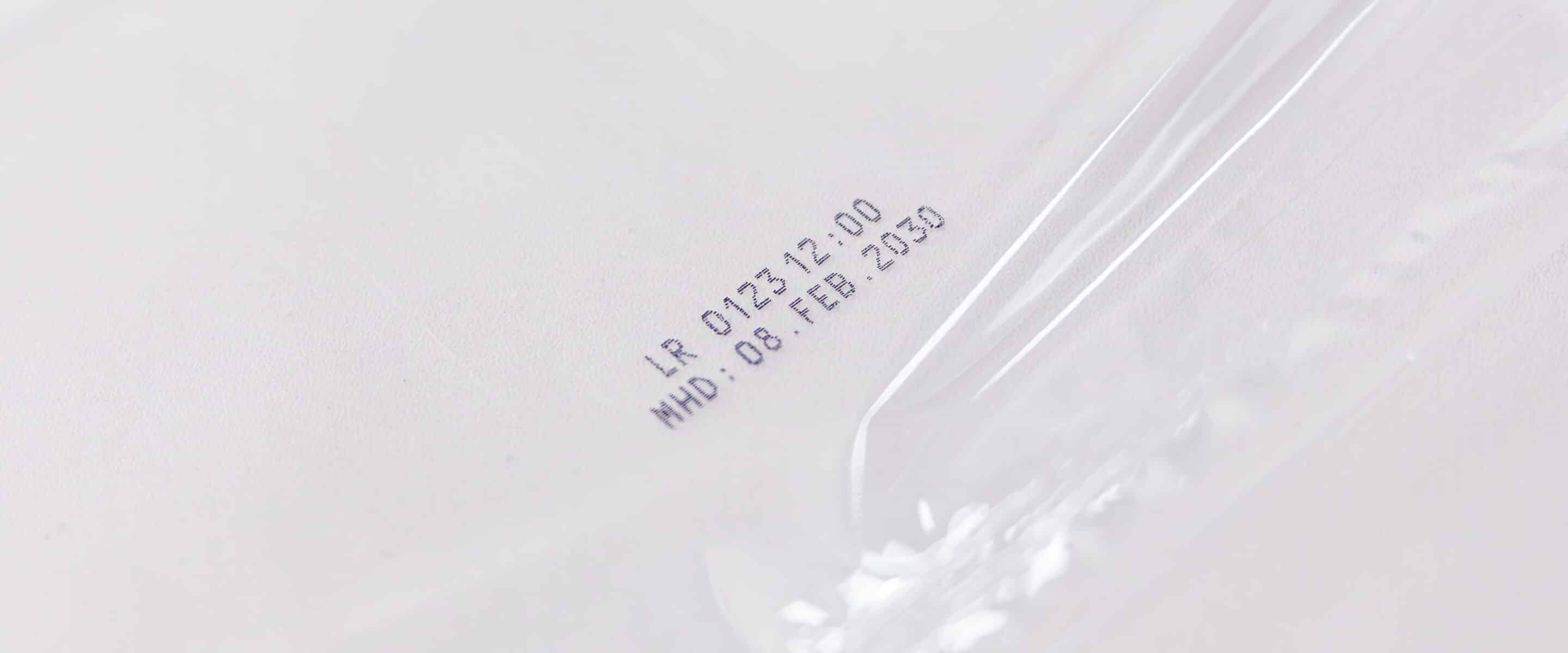 Transparent foil packaging with printed best-before date