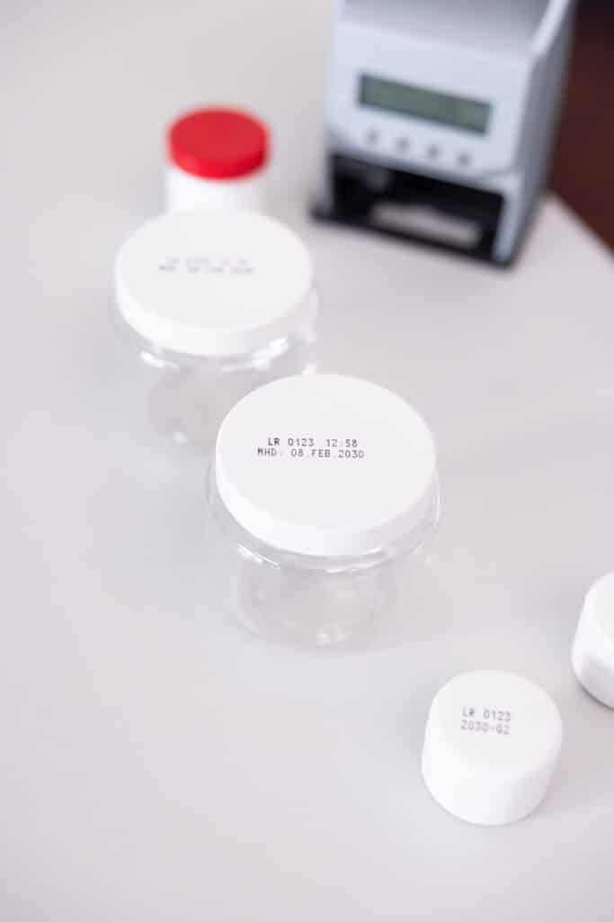 Plastic container with printed labeling